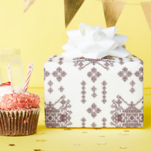 Papier Cadeau un arrière - plan blanc avec un motif rouge dessus