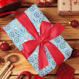Papier Cadeau Vélo en canne à sucre avec friandises de Noël bleu