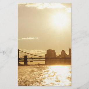 Papier Coucher de soleil de Cityscape sur la ligne aérien