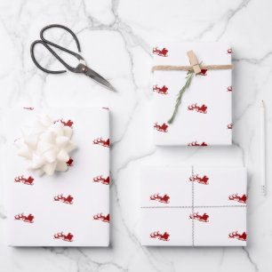 Papier d'enveloppement de Père Noël et de rennes v