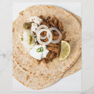 Papier Gyros pita with tzatziki coleslaw olives and feta