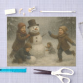 Papier Mousseline Children Building a Snowman (Artisanat)