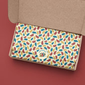 Papier Mousseline Plumes de dessin rouge, bleu et jaune sur crème