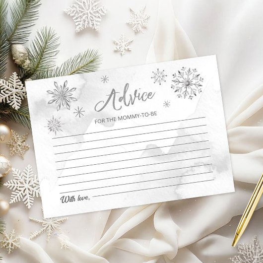 Papier Un petit flocon de neige se trouve sur le chemin B