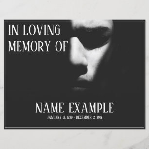 Papier Un visage endormi dans une demi-ombre