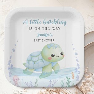 Papieren borden voor babyfeestje met jong zeeschil bordje