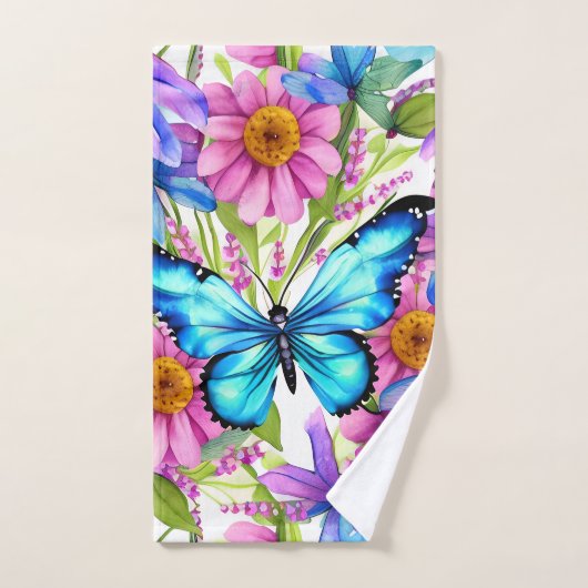 Papillon bleu dans un champ de fleurs (Serviette à main)