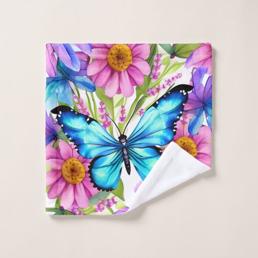Papillon bleu dans un champ de fleurs (Gant de toilette)