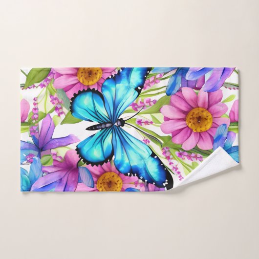 Papillon bleu dans un champ de fleurs (Serviette à main)