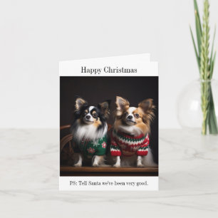 Papillon Chiens dans la carte de pulls de Noël