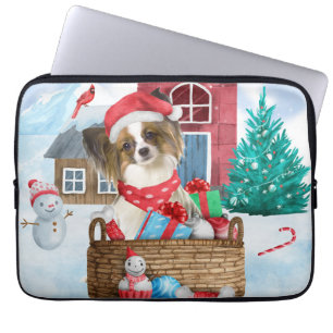 Papillon Dog in het sneeuwkersthondenhuis Laptop Sleeve