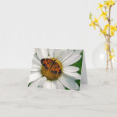 Papillon et carte de note de marguerite (Fleur jaune)