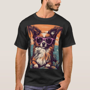 Papillon met zonnebril op het strand t-shirt