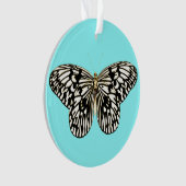 Papillon noir et blanc, arrière - plan turquoise (devant)