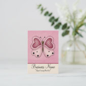 Papillon rose avec le carte de visite potelé de (Debout devant)