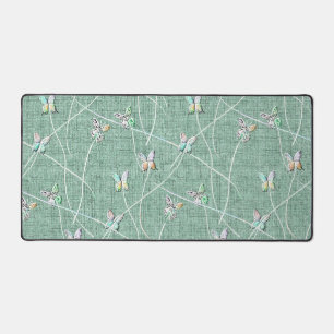 Papillons à l'aquarelle sur fond vert menthe