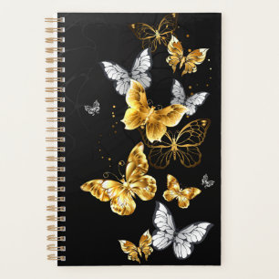 Papillons blancs et dorés