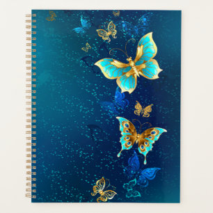 Papillons d'or sur un Arrière - plan bleu