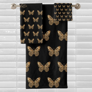 Papillons en or noir motif script de nom