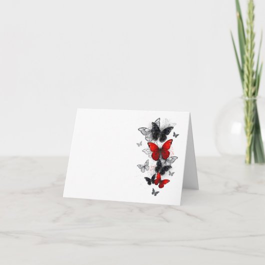 Papillons noirs et rouges volants (Devant)
