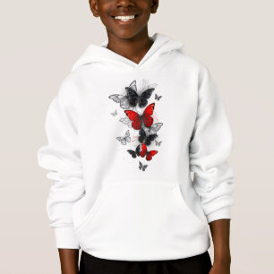 Papillons noirs et rouges volants