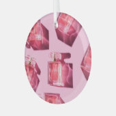 Parfumflessen, roze achtergrond, flatlay glas ornament (Voorkant links)