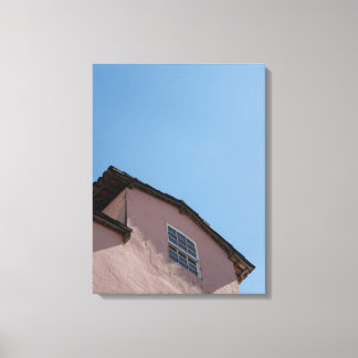 Pastel Pink Colonial Architecture Under a Clear Bl Canvas Afdruk