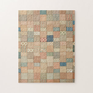 Patchwork quilt in gedempte kleuren legpuzzel