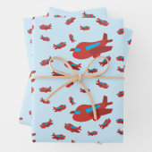 Patroon met rood en blauw vliegtuig inpakpapier vel (In situ)
