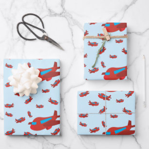 Patroon met rood en blauw vliegtuig inpakpapier vel
