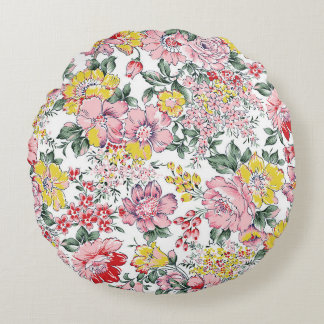 patroon van alloverte bloemen op witte achtergrond rond kussen
