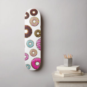 patroon van donuts, kleurrijke donuts, sproeten skateboard