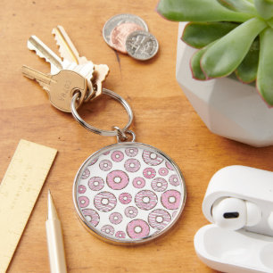 patroon van donuts, roze donuts, sproeten sleutelhanger