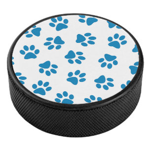 Patroon van poten, hondenpoten, blauwe poten hockey puck