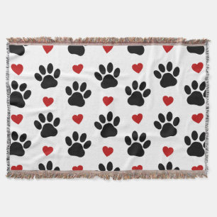 Patroon van poten, reuzenpoten, zwarte poten, rode deken