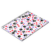 Patroon van poten, reuzenpoten, zwarte poten, rode notitieboek (Linkerzijde)