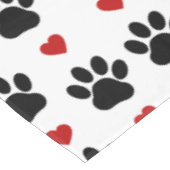 Patroon van poten, reuzenpoten, zwarte poten, rode tafelkleed (Gekanteld)