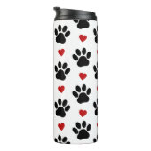 Patroon van poten, reuzenpoten, zwarte poten, rode thermosbeker (Geroteerd rechts)