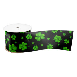 Pattern of green shamrocks on black background lint