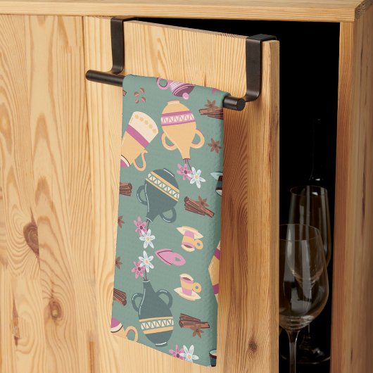 Patterned fabric featuring colorful teapots, cups, theedoek