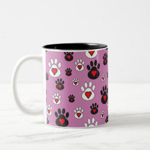 Paw prints met rode harten op roze tweekleurige koffiemok
