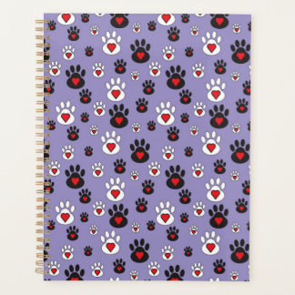 Pawprints met rode harten op blauw planner