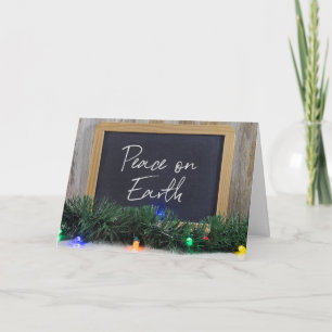 Peace On Earth-teken op zwart bord Feestdagen Kaart