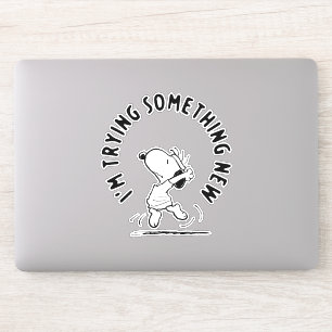Peanuts Snoopy probeert iets nieuws Sticker