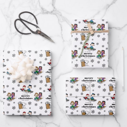 Peanuts | Winter Sleding Fun Patroon Inpakpapier Vel (Voorkant)