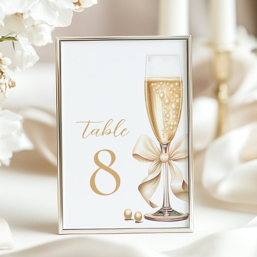 Pearls et Prosecco Gold Bow Numéros de table