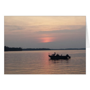 Pêche au coucher du soleil sur le lac
