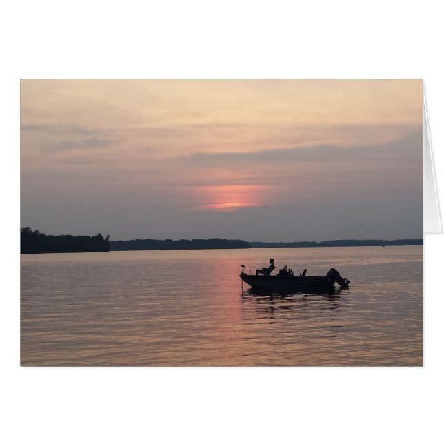 Pêche au coucher du soleil sur le lac (Devant horizontal)