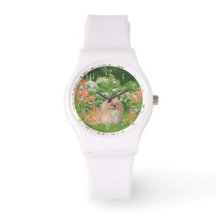 Pekingees in een tuin horloge