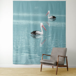 Pelican Couple Paddling op rustig aquawater Wandkleed